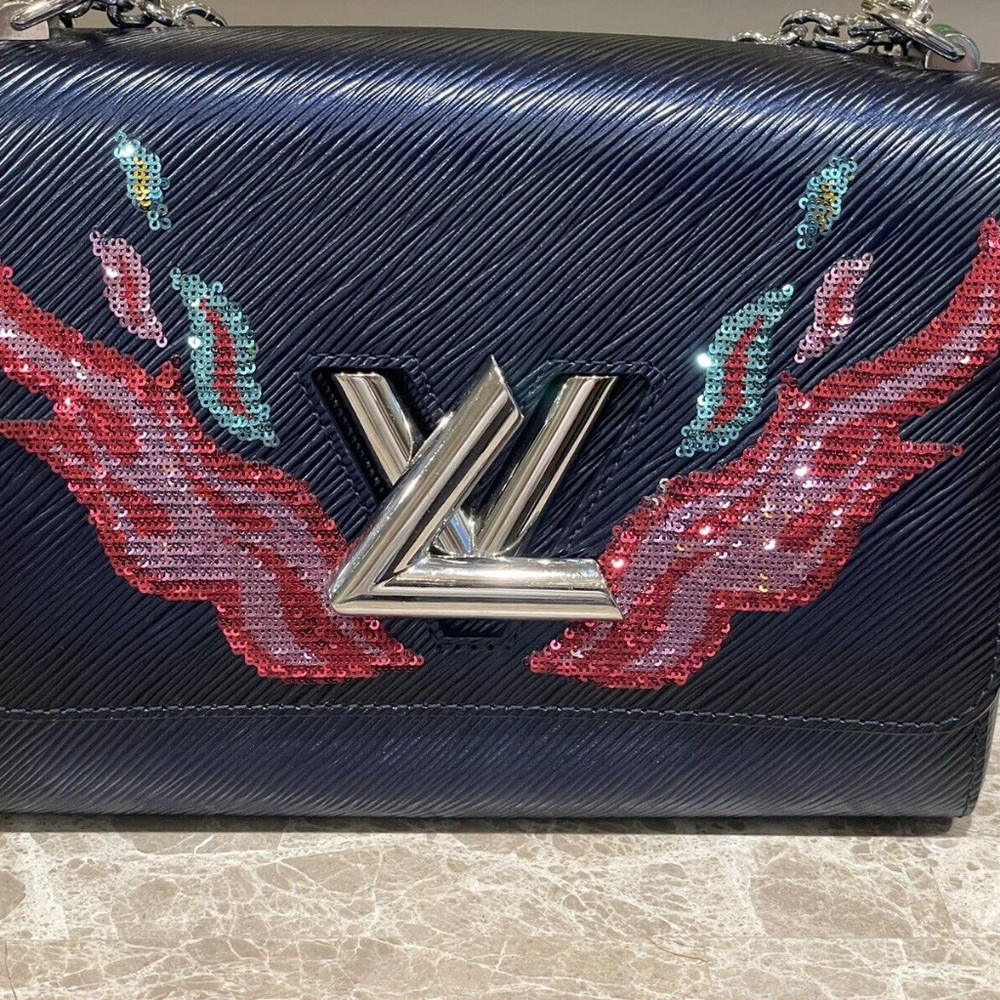 Loius Vuitton twist exotic leather bag
